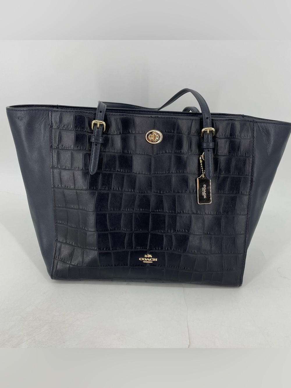 Coach black Turnlock Tote
In Croc Embossed Leather